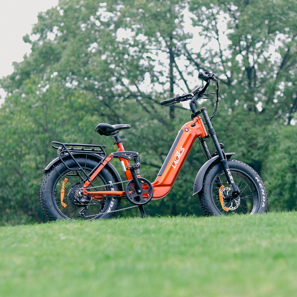 Orange Lacros Cyclone 2026 electric bike outdoors